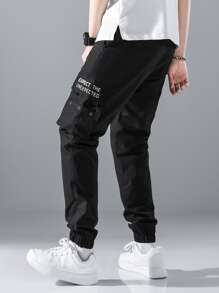 Manfinity Hypemode Men Slogan Graphic Grommet Detail Flap Pocket Drawstring Cargo Trousers - Black - View 2