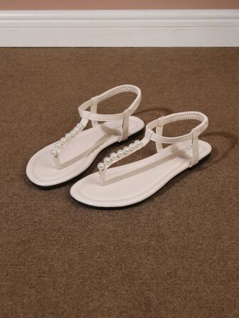 新款时尚女士单带拖鞋，罗马风休闲百搭拖鞋，黑色、米色、棕色可选，舒适平底沙滩凉鞋，博主推荐厚底凉鞋，夏季沙滩鞋，优雅搭扣低跟圆头拖鞋，简约户外拖鞋。请谨慎下单，因为鞋码可能偏大，每个人的身材比例都不同。百搭平底拖鞋