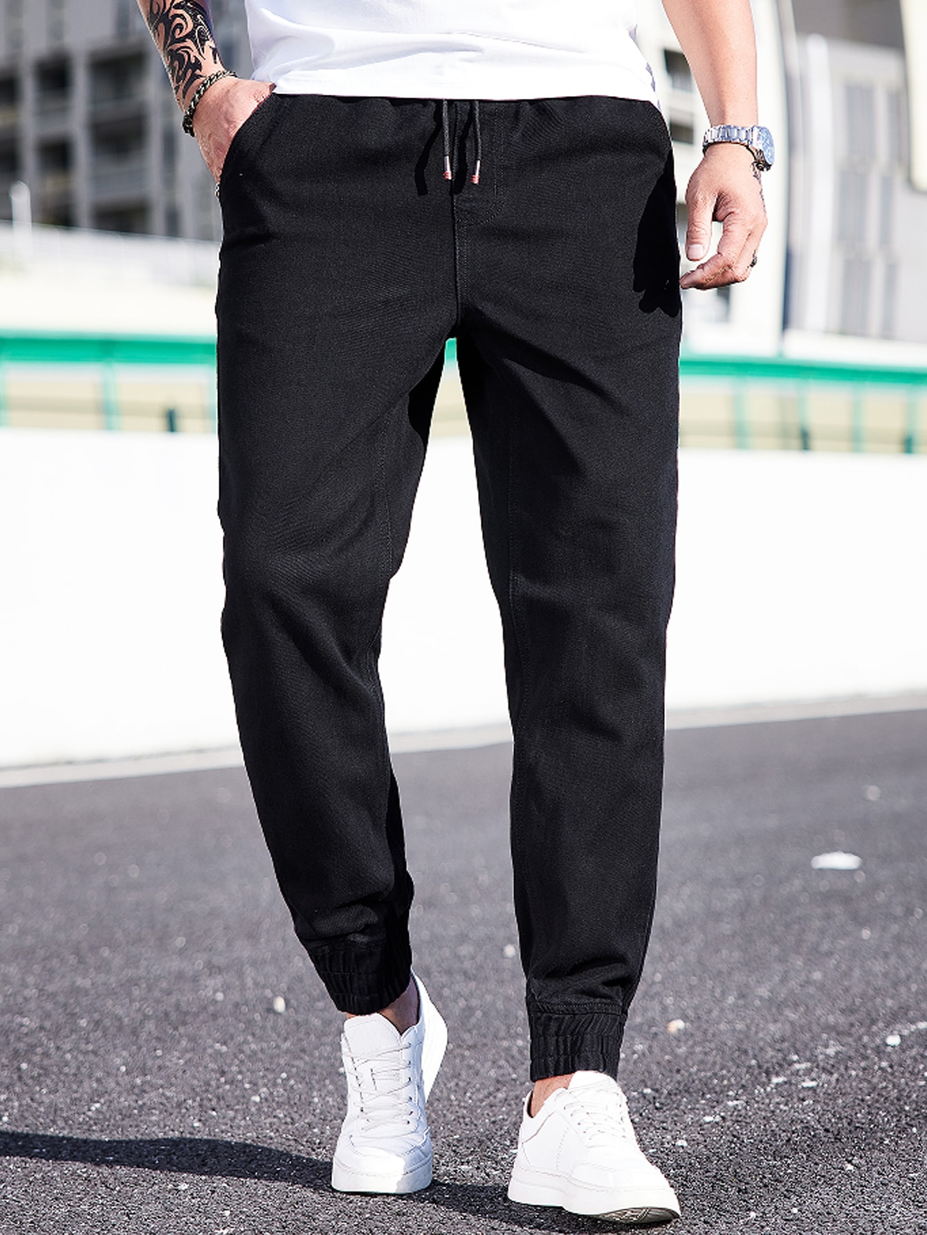 جينز رياضي رجالي بخصر أربطة مصنوع من القطن بقصة مس...