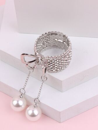 鑲嵌水晶和人造珍珠的髮夾,優雅時尚