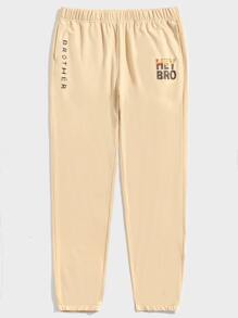 Manfinity Men Letter Graphic Slant Pockets Joggers - Khaki - View 1