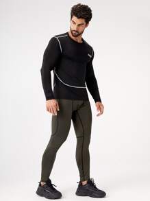 Manfinity Sport Corelite 男士拼接字母織帶頂針運動緊身褲和手機口袋