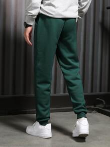 Manfinity Hypemode Men Solid Slant Pocket Joggers - Dark Green - View 2