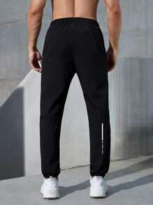 Manfinity Fitness Hombres Pantalones deportivos con estampado de letra de cintura con cordón - Negro - Ver 2