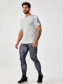 Manfinity Fitness Hombres Camiseta deportiva con estampado de camuflaje de manga raglán - Gris - Ver 4