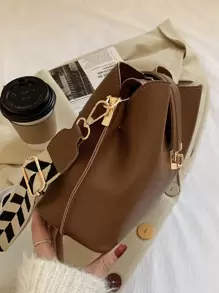 时尚百搭复古风斜挎包，小众设计，纯色，简约轻巧，可调节肩带水桶包，几何肩带单肩包，适合上班、通勤、外出、约会、逛街（肩带图案随机）。 - 棕色 - 查看 6