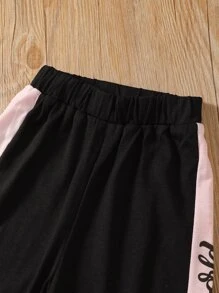 SHEIN T-shirt grafica con slogan e pantaloni joggers a pannelli per ragazza giovane
