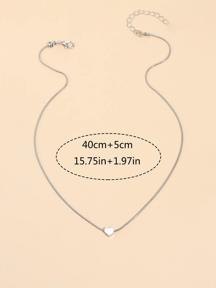 1條簡單的心形吊墜鎖骨項鏈,適用於女性作為約會/日常配飾,使用銅材質打造的珠寶 - 銀色 - 查看 6