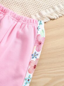 SHEIN Chaqueta Estilo Universitaria Con Mangas Raglán Y Estampado Floral Para Niña Y Pantalones De Chándal A Juego - Rosa Pálido - Ver 7