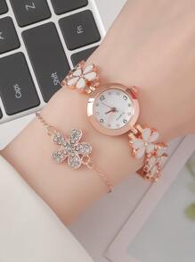 1 块花饰石英表和 1 块手链作为返校学生的礼物