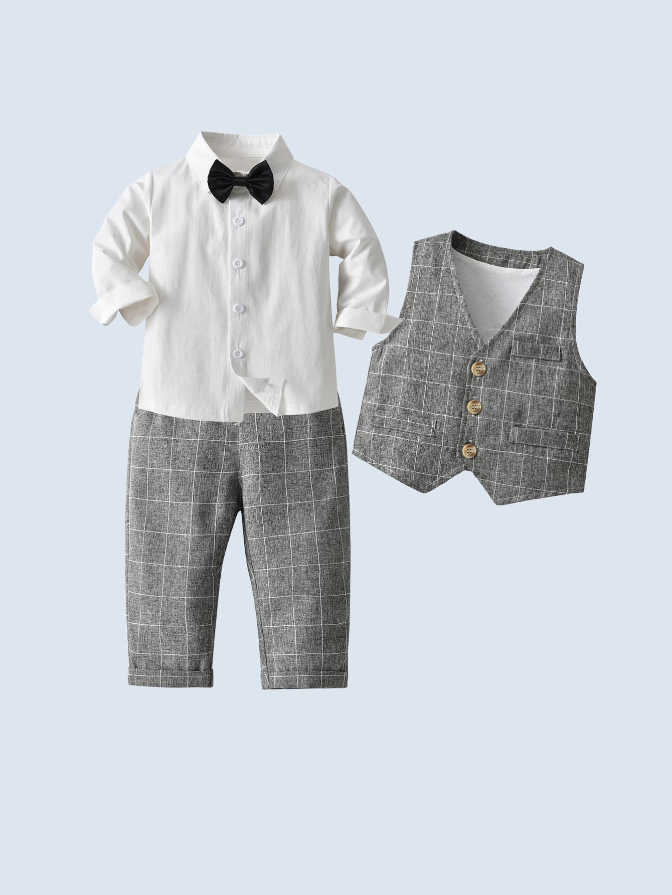 小男童前蝴蝶結襯衫和格紋馬甲西裝外套和褲子