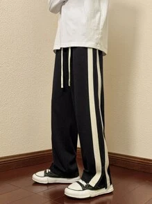 Quần thể thao Nam Dây kéo Túi Chia Sọc - màu đen - Xem 6