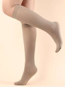 Calcetines altos unicolor