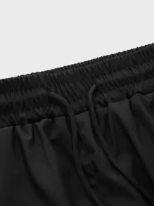 Manfinity Athleisure Pantalones cortos deportivos de verano para hombres con cintura ajustable al estilo novio, elásticos y cómodos - Negro - Ver 4