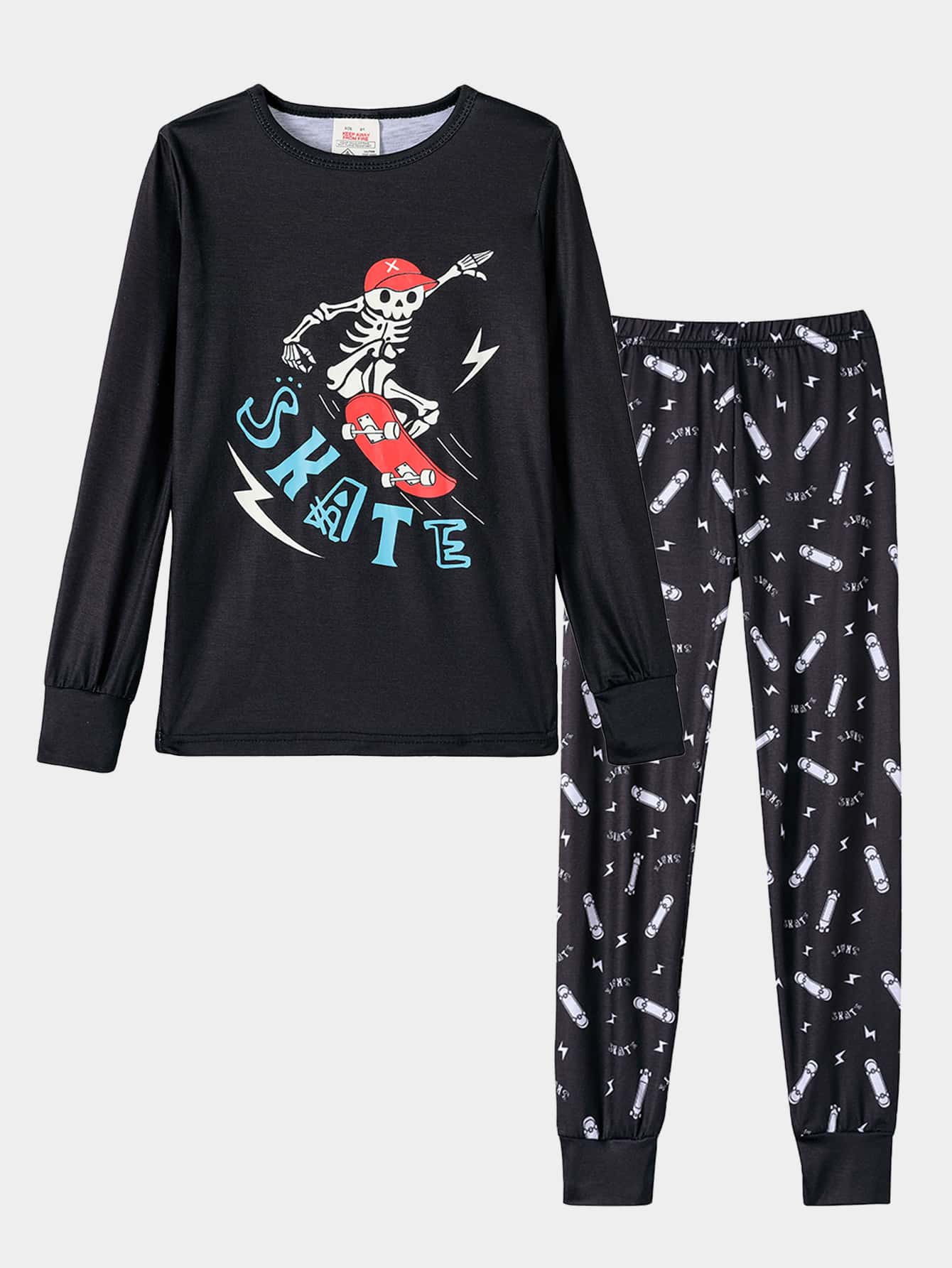 2pcs Boys Snug Fit Pajama Set With Glow-In-The-Dark Football & Skull Design, Long Sleeve Top And Pants, Comfy Holiday Sleepwear - Black - View 1