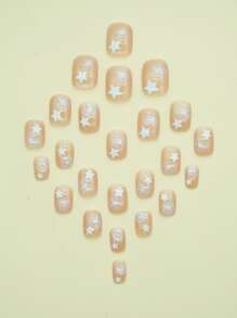 使用24入組短方形星星圖案假指甲和1入組指甲銼和1張膠帶立即升級您造型