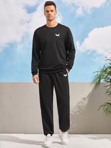 Manfinity Homme Hombres Pantalones deportivos con estampado de pájaro con bolsillos oblicuos - Negro - Ver 2