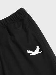 Manfinity Homme Hombres Pantalones deportivos con estampado de pájaro con bolsillos oblicuos - Negro - Ver 4