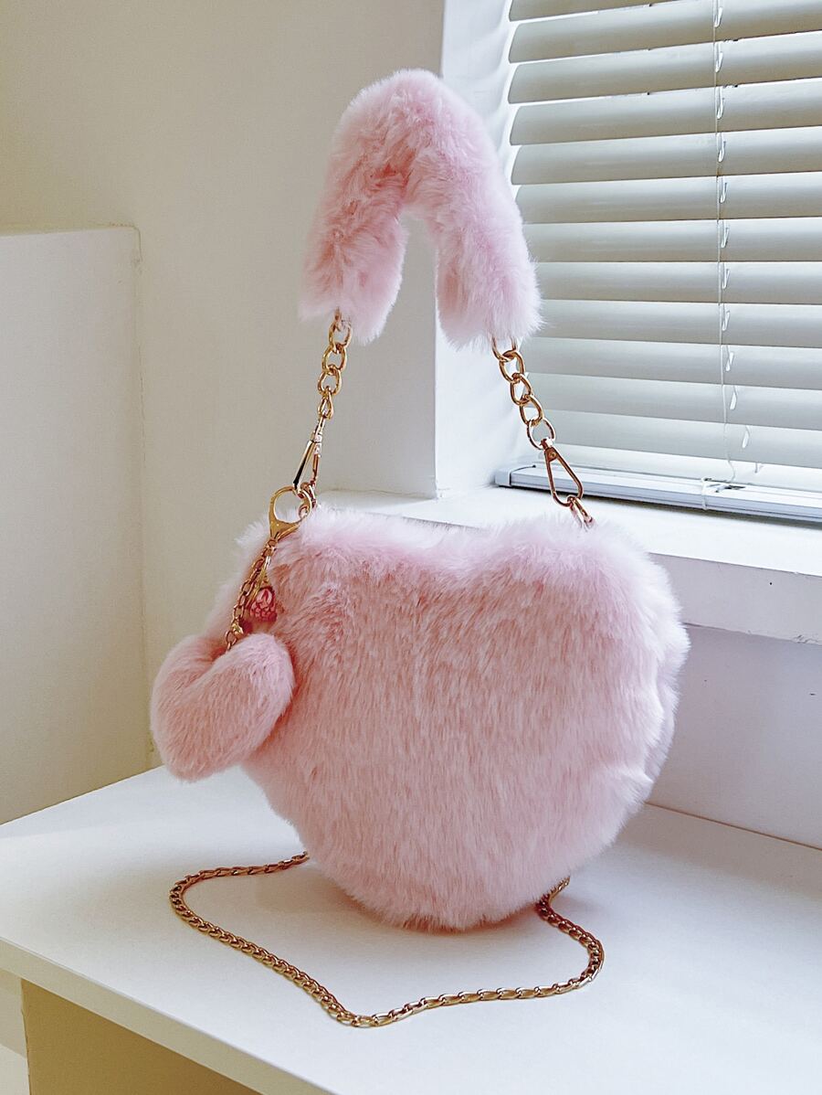 1个纯色心形毛绒手提包，休闲时尚，柔软舒适，配有可调节肩带和小吊坠，适合秋冬季节。 - 淺粉色 - 查看 1