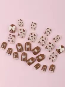 24入組短方形豹紋蝴蝶結心形全覆式假指甲，供女性和女孩即時升級外觀，附1pc指甲銼和1片膠帶壓指甲，指甲用品