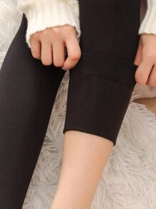 1双纯色加绒内衬抓绒紧身裤，舒适保暖