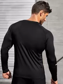 Manfinity Fitness Camiseta deportiva de manga larga con mangas raglán y cinta reflectante, estilo de novio - Negro - Ver 2