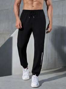 Manfinity Fitness Hombres Pantalones deportivos con estampado de letra de cintura con cordón - Negro - Ver 3
