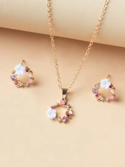 1 st halsband med blomdekor och 1 par örhängen