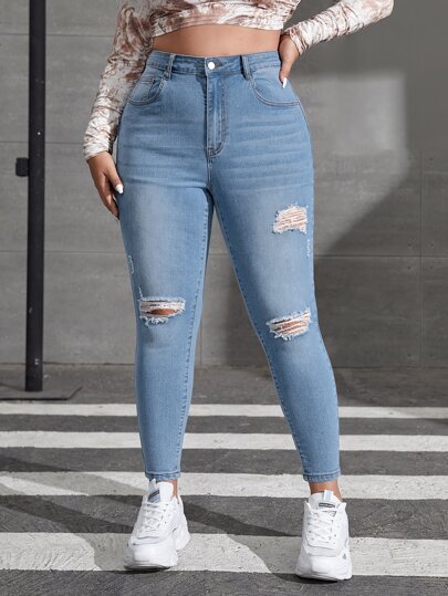 بنطلون جينز نحيل باهت اللون ممزق مهتري الحواف مقاس كبير