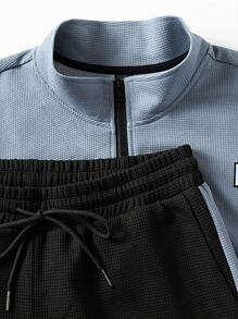 Manfinity Homme Hombres Cazadora de color combinado con parche de letra con cremallera con pantalones deportivos