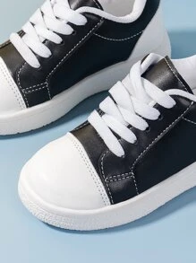 運動板鞋適用於男孩雙色前綁帶運動鞋