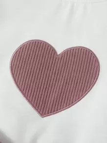 Sudadera con estampe de corazones y falda con cinturón para niña