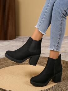 Botas Chelsea negras elegantes de un solo color con cremallera lateral, tacón grueso y, para combinar con ropa de otoño, se pueden usar con pantalones