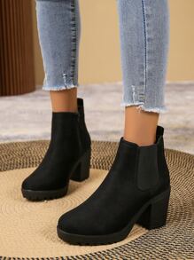 Botas Chelsea negras elegantes de un solo color con cremallera lateral, tacón grueso y, para combinar con ropa de otoño, se pueden usar con pantalones