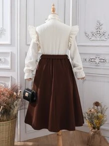 女孩荷葉邊荷葉袖襯衫和腰帶半身裙