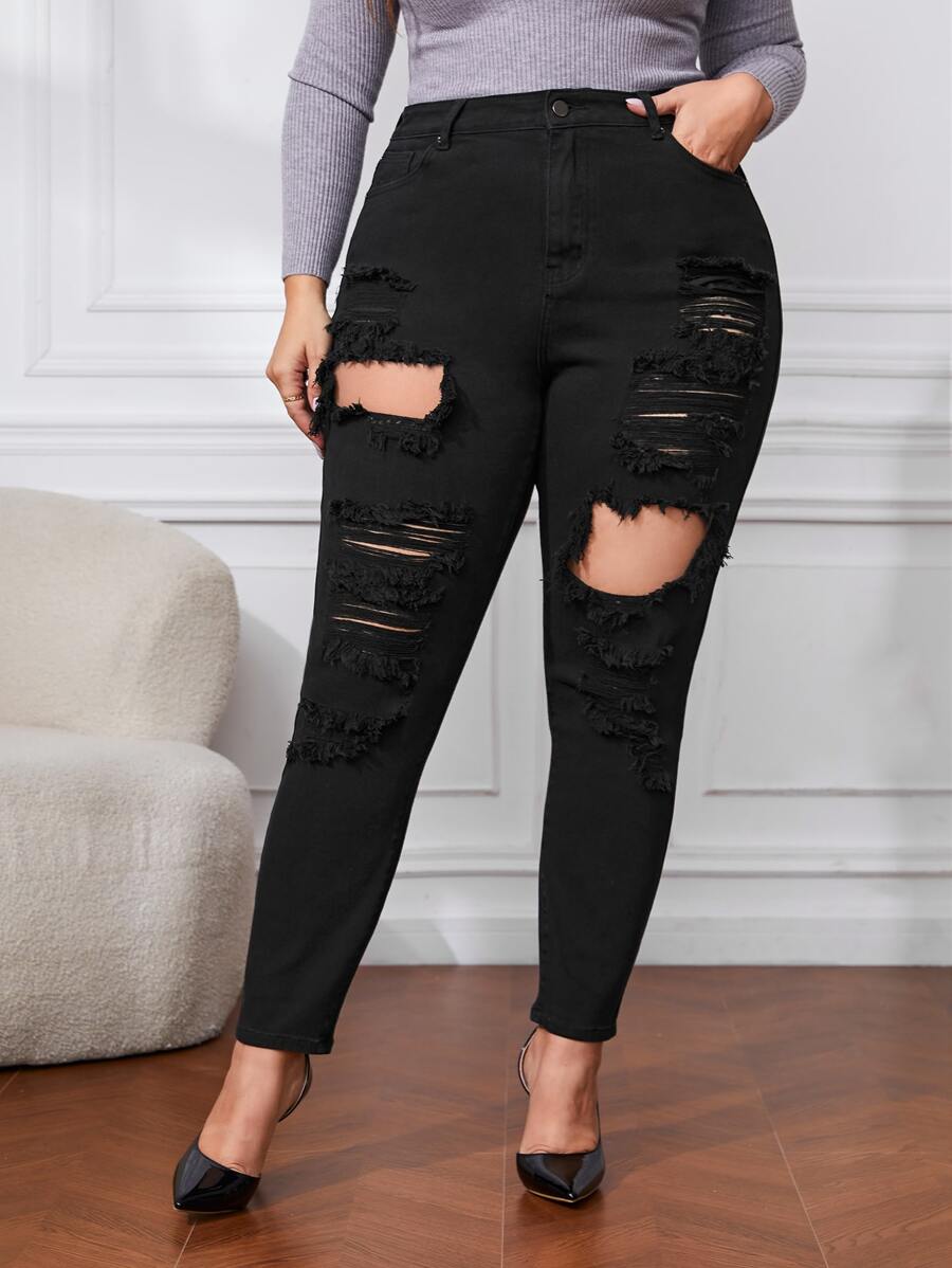 Jeans ajustados de talle alto con abertura desgarro crudo - Negro - Ver 1