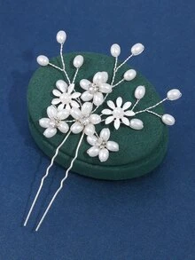 珍珠和花朵裝飾婚禮髮夾