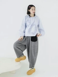 Blusa de rayas ribete fruncido de manga raglán