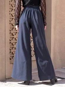 Rusttydustty Pantaloni evazați cu imprimeu floral - Albastru marin - Vizualizare 2