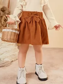 Váy bé gái Dải chun Nơ trước màu trơn Dễ thương - màu nâu - Xem 1