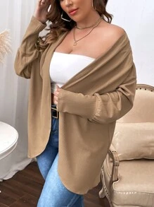Manteau manches bouffantes ouvert