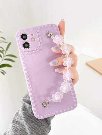 素色手機殼帶花朵裝飾手繩