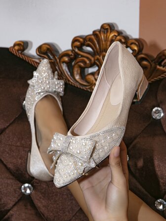 水鑽和蝴蝶結裝飾尖頭平底鞋