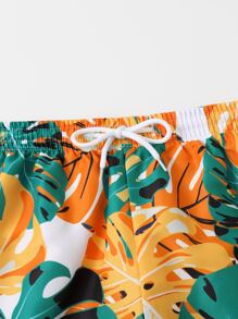 青少年男生熱帶印花泳褲