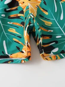 青少年男生熱帶印花泳褲