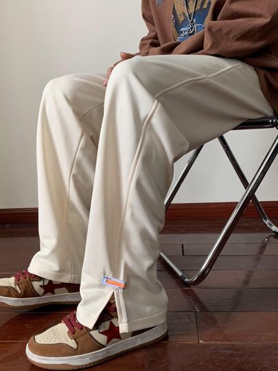 uomo Pantaloni sportivi con toppa lettera orlo a fessura