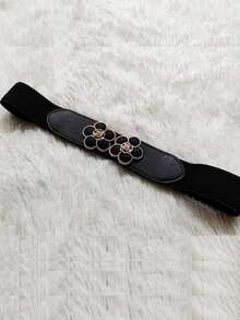 Cinturón elástico con diseño de flor