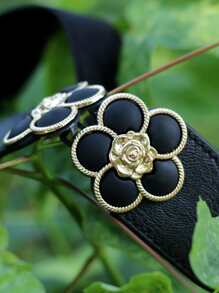 Cinturón elástico con diseño de flor