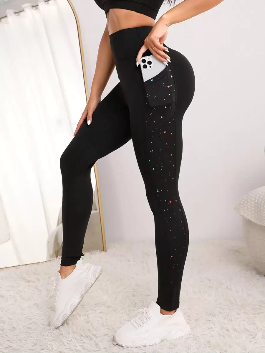Easithlete Leggings deportivos con estampado de salpicaduras de tinta y bolsillo para teléfono para mujeres - Negro - Ver 1