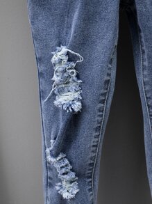 Salopetă din denim cu buzunar rupt în față pentru copii mici